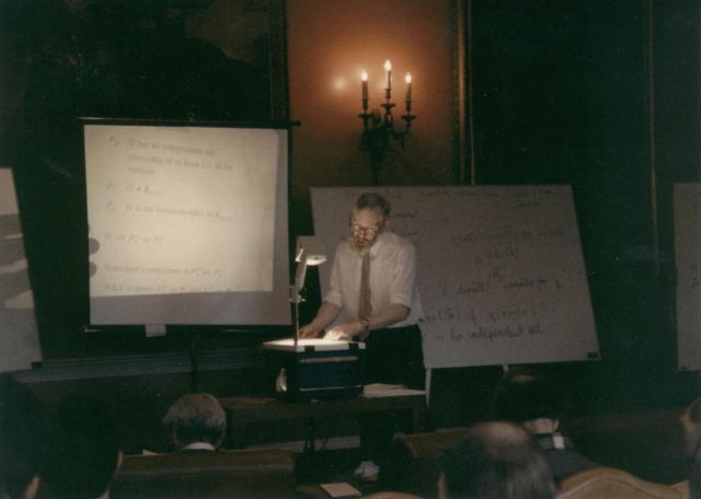 Picture of Douglas lecturing at Cambridge, 1988